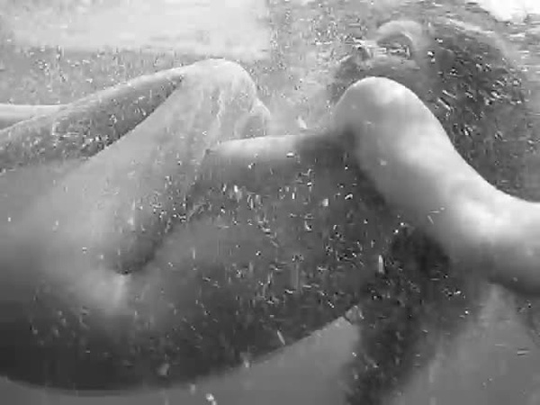 estella-warren-swims-topless-innocence-cap-05.jpg
